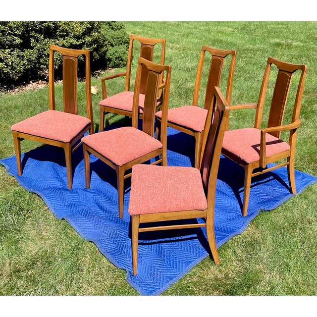 Elevate your dining space with this striking, expertly curated set of six (6) vintage high-back dining chairs from...