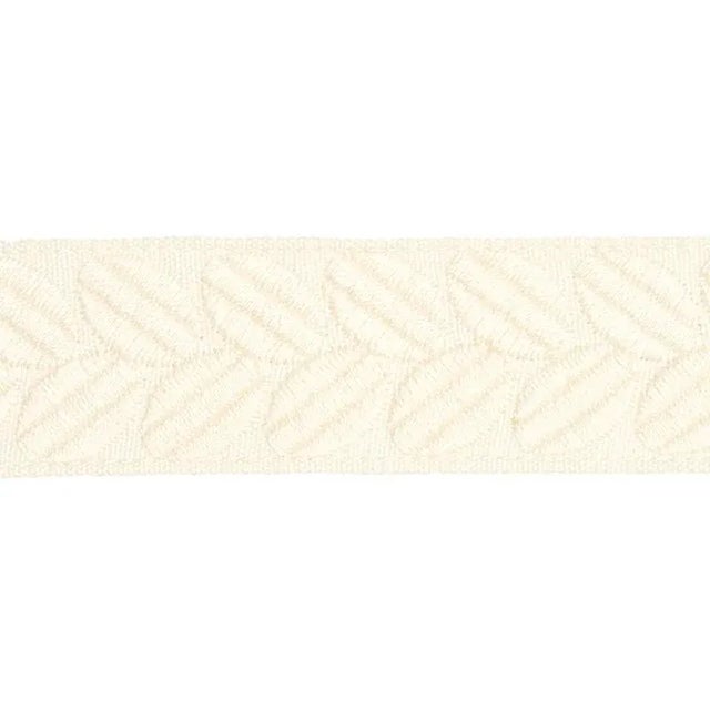 An exuberant embroidered tape with a leaf-like pattern rendered in satin stitching; inspired by a document in our...