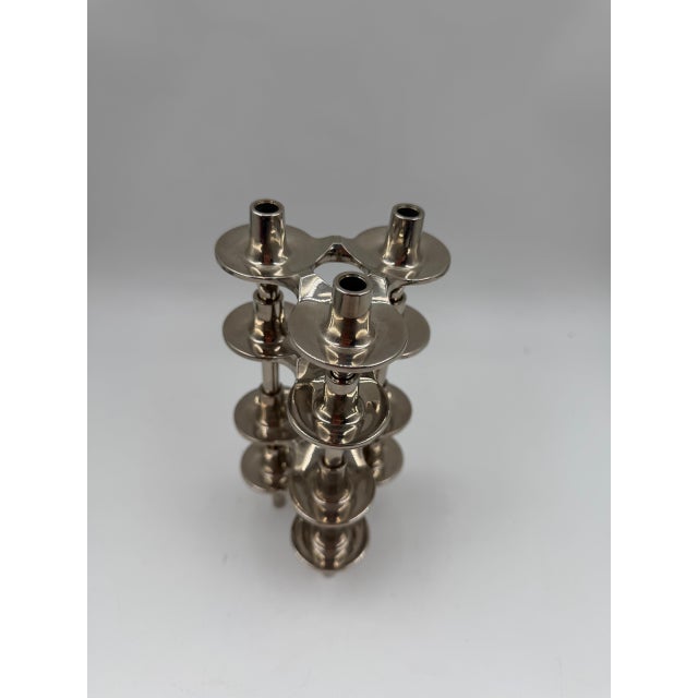 A rare and iconic set of four modular candleholders by ceasar stoffi for emil nagel / bmf (bayerische metallwarenfabrik),...