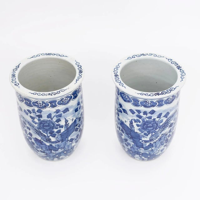 Pair of Chinese blue and white porcelain vases with classic form, in the Chinese Export manner and hand decorated all...