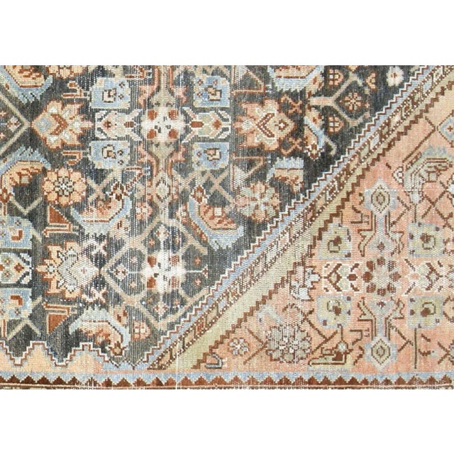 1940s Persian Melayer Rug. Hand woven in the Hamadan region of Iran. Distressed and refinished in the U.S. These...