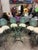 Beautiful Veneman vintage clamshell cast aluminum table and chairs set with powder coating. All original. Includes a...