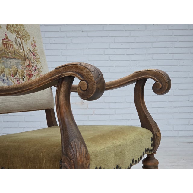 1950s, Danish high back armchair. Original hand woven wool on the back, green furniture velour, carved oak wood. Original...