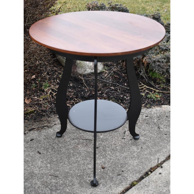 Vintage (2000) Round Side Table has a Transitional Style. Made by Ethan Allen. The Table has a Two Tone Finish. Made of...