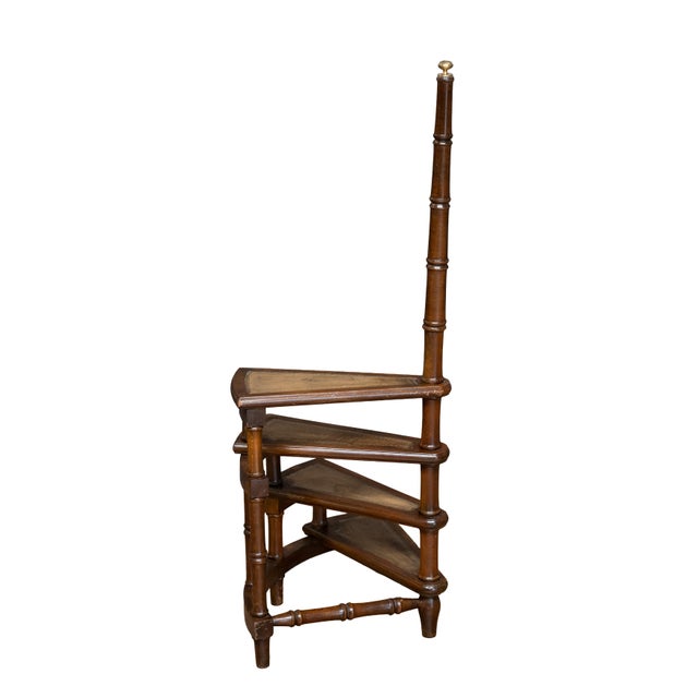 A fine set of English spiral bed steps (also known as library stair steps), in the Regency style, from the 19th century....