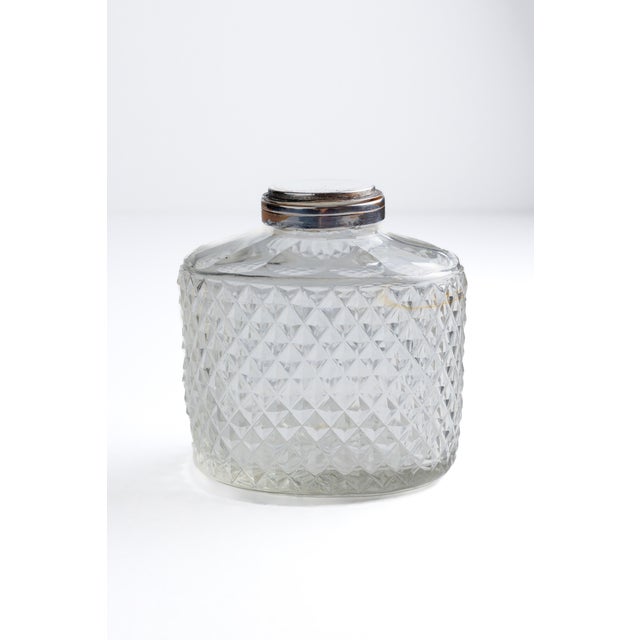 Charming antique dressing table scent bottle, circa 1890-1915, featuring an allover diamond hobnail-cut body. Hinged round...