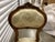 Pretty pair of French boudoir chairs. These small chairs were traditionally in a bedroom. The silk brocade upholstery is...