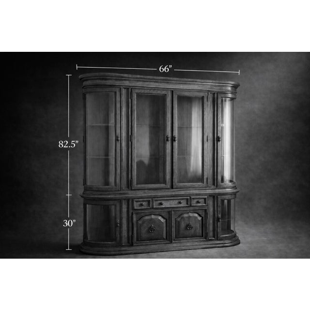 Large Mid-20th Century Colonial Revival Oak China Cabinet With Curved Glass Display Ends & Interior Lighting — Two-Piece Hutch For Sale - Image 9 of 11