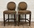 This is a gorgeous pair of Marge Carson French Louis XVI style round back bar stools in brown and gold with detailed...