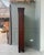This edwardian-style english display bookcase captivates with its slender form, small-paned door, and deep, dark patina. A...
