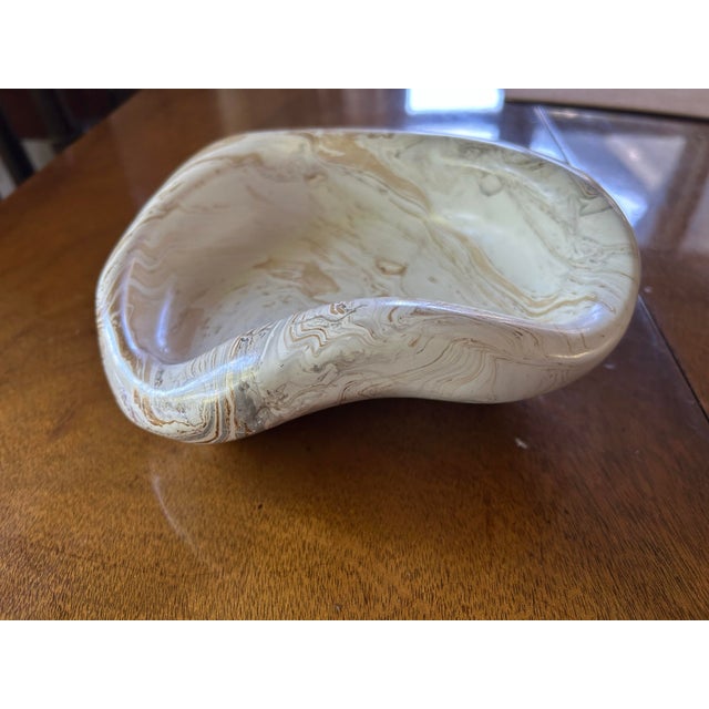 Vintage 70's handmade studio pottery with organic form and distinctive swirl pattern in shades of white, cream, and...