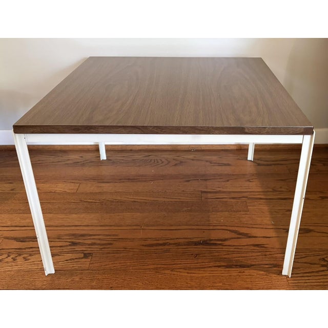 Classic Florence Knoll-designed T Angle Side Table, Model 304 Square top with walnut laminate, white powder-coated base....