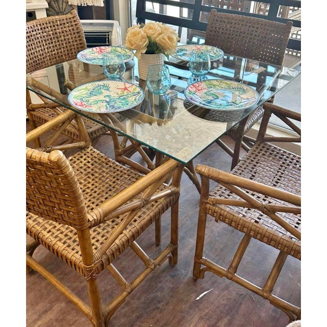 Contemporary 4 Refurbished McGuire Antalya Rattan and Laced Leather Strapped Chairs For Sale - Image 3 of 8