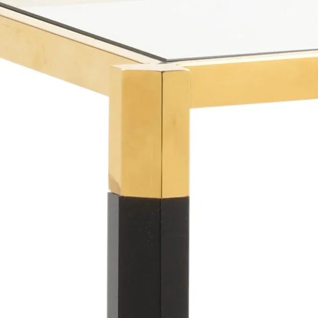 Crafted from black acrylic and gold stainless steel with four caster wheels, the boulevardier bar cart will add a touch of...