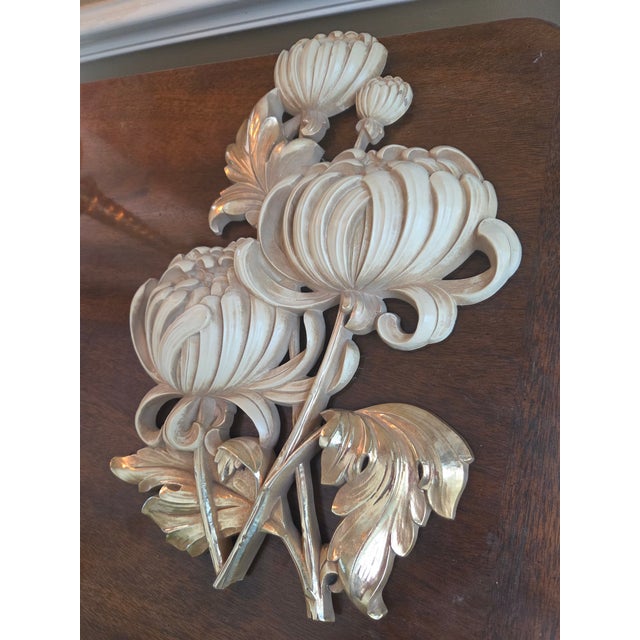 Bring a touch of 1960s Hollywood Regency glamour into your home with this authentic, American-made Syroco Inc. floral wall...