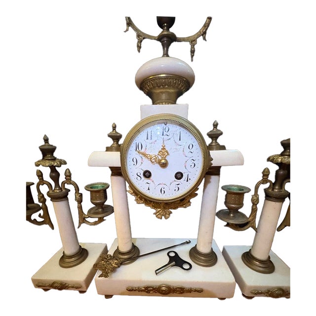 This Antique 19th-Century French Mantle Clock Set Features White Marble (Often Alabaster) and Gilt Bronze Ormolu Mounts. For Sale
