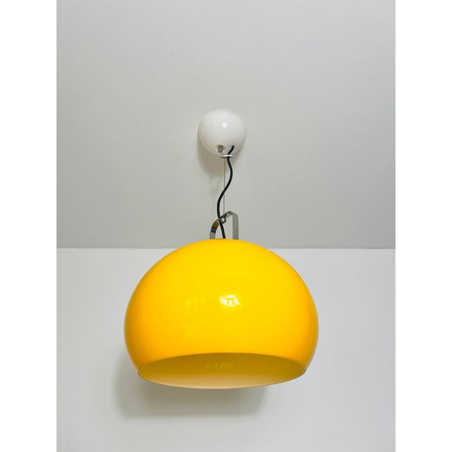 Enhance your interior with this distinguished Iguzzini Ceiling Lamp, a hallmark of Italian design from the 1970s....