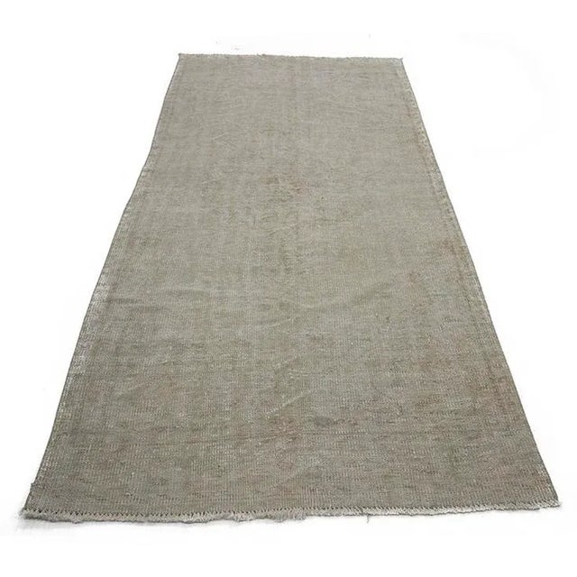 Vintage washed out rug from Oushak region of Turkey. Approximately 50-60 years old. In very good condition