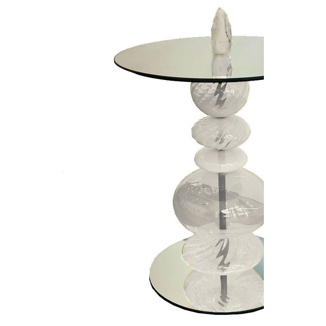 Our Abacus Pieces were intellectually conceived as vertical timelines with each sphere representing a time period or...