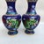 This is a striking pair of vintage cloisonné enamel vases, crafted from a substantial copper body with intricate wire...
