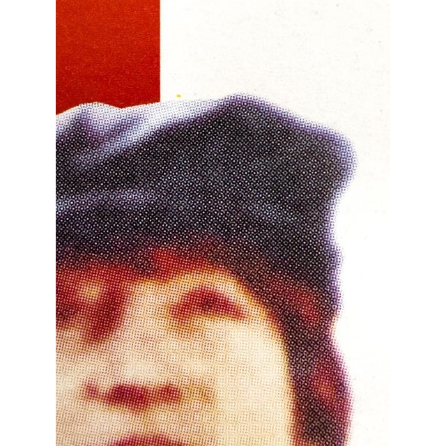 The Piece This original vintage movie poster features the iconic imagery from The Beatles' 1965 film "Help!". The design...