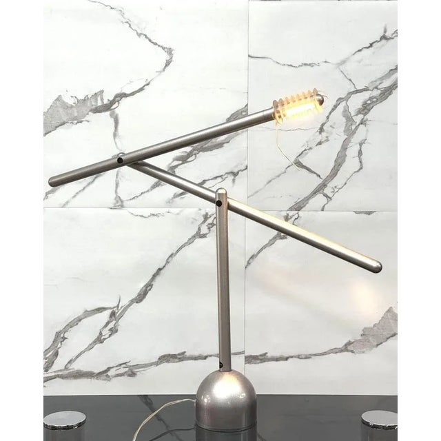 Mira desk lamp by Mario Arnaboldi for Civic. Adjustable lamp with metal frame and acrylic glass diffuser. The item is in...