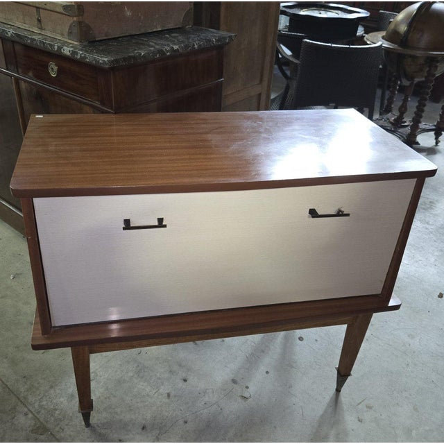 Mid-century style vintage bar cabinet from the 1950s-60s this vintage bar cabinet in the mid-century style features clean...