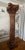 An antique solid wood carved corinthian column out of a single tree log. Extremely heavy. The patina and color of the wood...