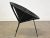 A mid century modern black wicker cane lounge chair with black iron base. Seat height is 14.5”. 27” wide. 25.5” deep....