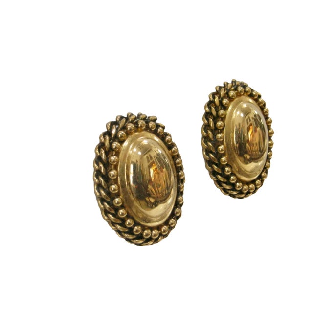 This is part of Chairish’s Costume Jewelry assortment. Stunning 1980s brilliant gold plate large cable framed mirrored...