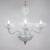 This hand‑blown Murano chandelier presents a refined opaline Filigrana palette, its milky translucence laced with soft...