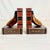 We have here a pair of Golf Club Motif Bookends. They feature a pair if wood clubs with Trompe L’Oeil books making the...
