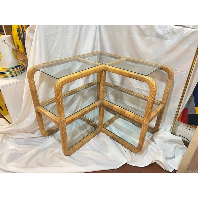 1970's Bielecky Brothers Wrapped Rattan and Glass Waterfall Two tiered Corner Etagere or Bookshelf. A perfect addition to...