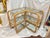 1970's Bielecky Brothers Wrapped Rattan and Glass Waterfall Two tiered Corner Etagere or Bookshelf. A perfect addition to...