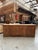 This antique Art Deco counter in solid oak has been fully restored. At the back, it has 4 functional drawers and 2 large...
