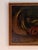 This oil painting presents a dramatic arrangement of sea creatures rendered in rich, darkened tones that draw the eye to...