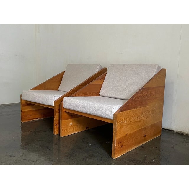 Monumental scale meets strict geometry in this pair of 1970s Spanish rationalist armchairs. Thick planks of solid pine...