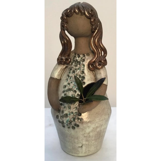 Beautiful 1960s vintage art pottery figurine from Swedish Studio of Ebogen , Malmo . Stylized girl in pale green glazed...