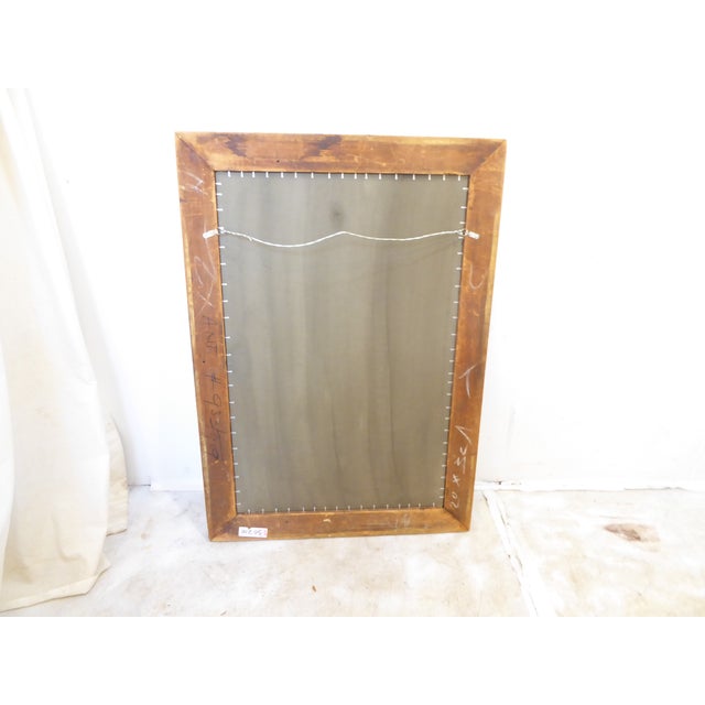 This silverleaf mirror has an old, distressed finish and measures 36.5"H x 26"W.