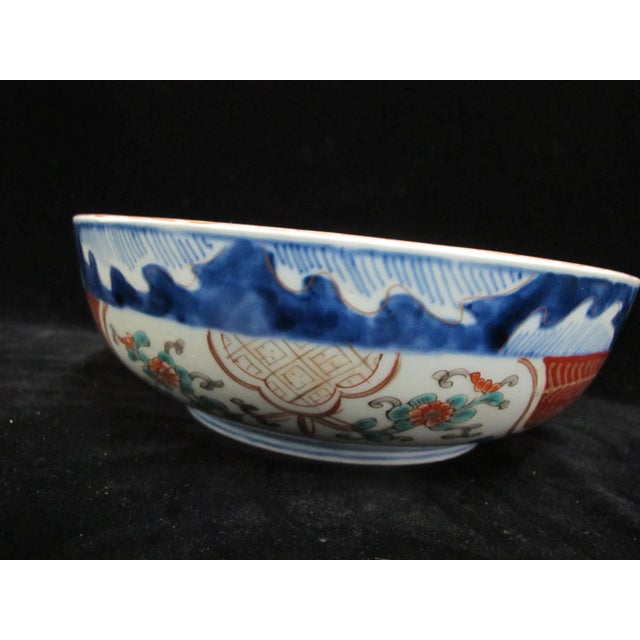 Unique and very sweet Japanese porcelain Arita bowl. Red, blue, and gilt Imari design of ornate flowers with a rabbit...