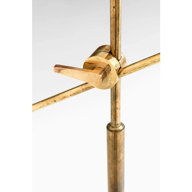 Rare adjustable floor lamp designed by T.H. Valentiner. Produced by Poul Dinesen in Denmark. This piece is attributed to...