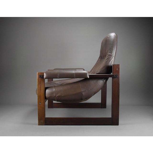 Timeless elegance with the mp-91 lounge chair by percival lafer step into the world of refined mid-century modern design...