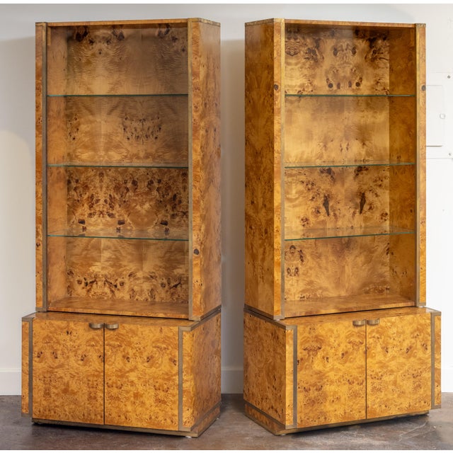 A fine set of Italian Modern two-tiered open bookcases or showcase display cabinets, circa 1970s - each cabinet featuring...