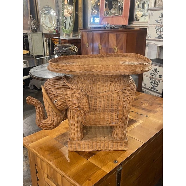 The Vintage Rattan Elephant Side Table is a charming and unique piece of furniture that adds character to any living...