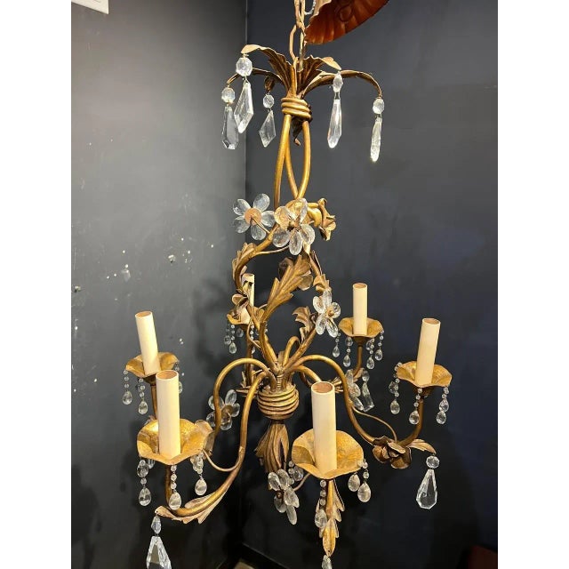 A circa 1930’s gilt metal Bagues chandelier with crystal flowers