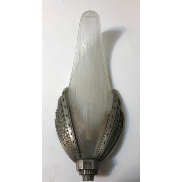 Pair of French Art Deco sconces signed by Verrerie des Hanots in clear frosted glass shades with geometric motif details...