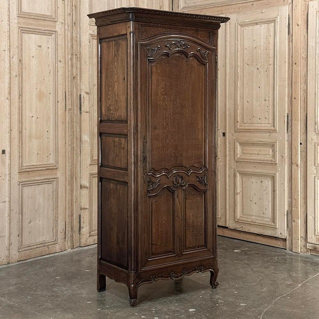 A charming 19th century Country French oak bonnetière, embodying the quiet romance of provincial living. Originally...