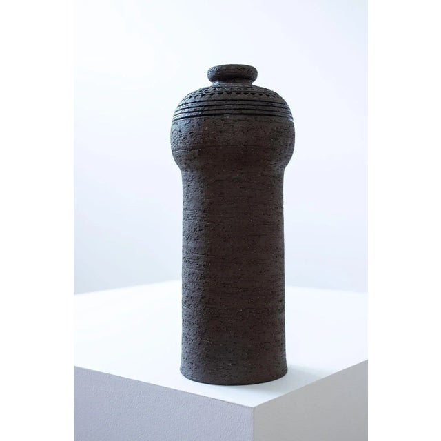Studio vase by Inger Persson, manufactured at Rörstrand in Sweden during the 1960s. Made from unglazed chamotte stoneware....