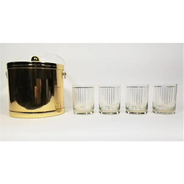 Mid Century 1970s Culver 22K set of 4 double old fashioned glasses with gold ice bucket. All glasses marked Culver. Some...