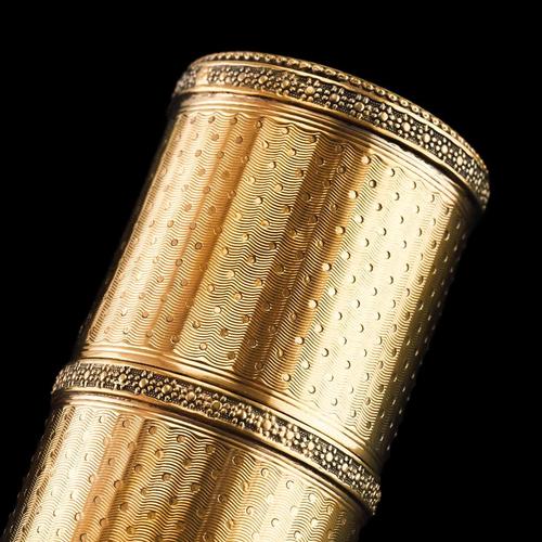 Stunning solid silver-gilt cylindrical box made in France, c.1890. The box features a two-piece pull-off lid design with a...